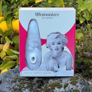 Womanizer box among lemons