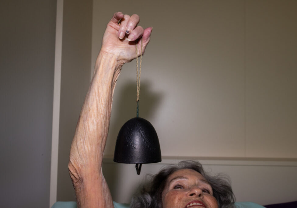 Joan Price rings the bell 